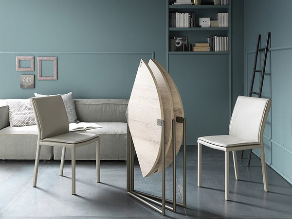 Icaro round transforming table by Altacom Italia