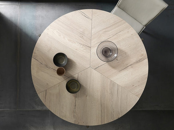 Icaro round transforming table by Altacom Italia